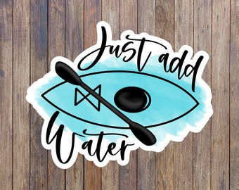 May include: A blue watercolor sticker with a black outline of a kayak and paddle. The text "Just add water" is written in black cursive.