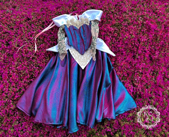 Sleeping Beauty's Changing Color Dress at one of the shops in the Magic  Kingdom, Walt Disney World | Colorful dresses, Dream wedding, Dress