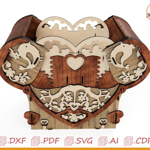 May include: Wooden dog-shaped box with intricate laser-cut details. The box features a heart-shaped design, bird and floral cutouts, and a two-tone brown and natural wood finish. The box is designed for storage and decorative purposes.
