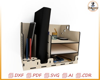 May include: A wooden desktop organizer with three shelves. The organizer has a black binder, a tablet, and pens in the top section. The middle shelf has a piece of paper and the bottom shelf has scissors and a pencil.