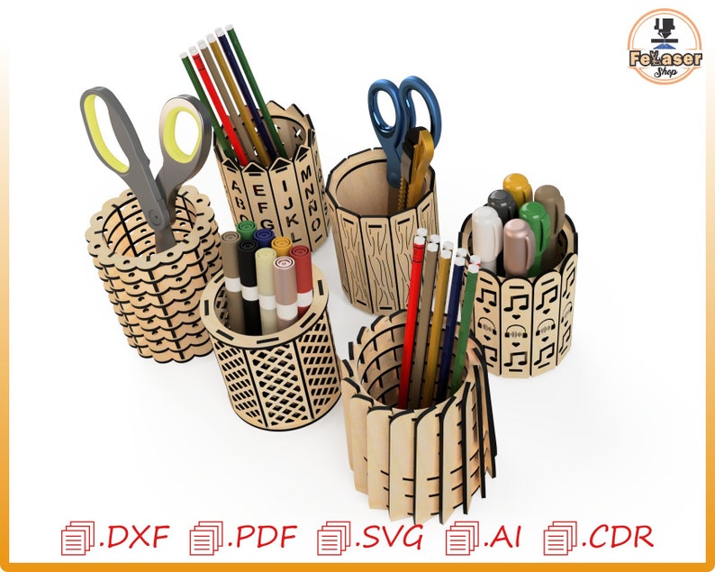 May include: Five wooden pencil holders with different designs. The holders are made of laser-cut wood and feature various patterns, including letters, stripes, and geometric shapes. The holders are filled with pencils, pens, and scissors.
