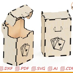 May include: Two wooden card boxes, one open and one closed. The boxes are light-colored with black accents and feature a laser-cut design of playing cards. The open box shows the interior, while the closed box has a handle.