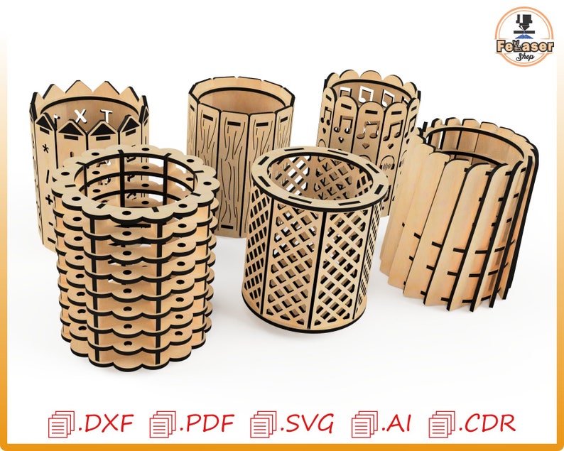 May include: Five different laser cut wooden pencil holders. The holders are all different designs, including a fence, a musical note design, a geometric pattern, and a simple wood design.