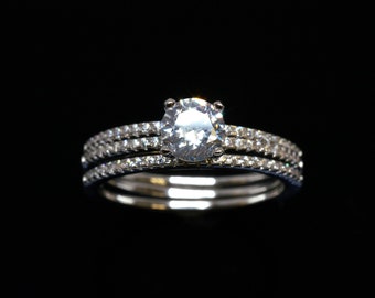 Silver ring set, Engagement ring and two bands, dazzling round cubic Zircon in the middle.