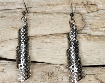 Pendientes decorados con una espiral.