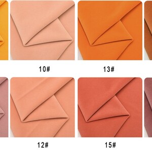 May include: Eight fabric swatches in various shades of orange, pink, and red. The swatches are labeled with numbers 09, 10, 11, 12, 13, 14, 15, and 16.