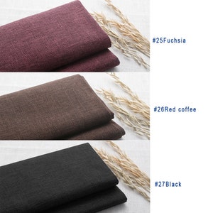 May include: Three fabric swatches in different colors: fuchsia, red coffee, and black. The swatches are folded and arranged vertically on a white surface. The color names are written in white text on a black background.