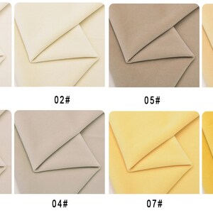 May include: Eight fabric swatches in different shades of beige and yellow. The swatches are labeled with numbers 01 through 08.