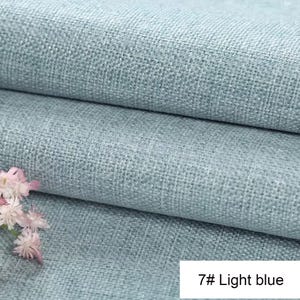 May include: A light blue fabric with a visible woven texture, folded into two horizontal layers. A small cluster of white and light pink flowers is positioned in the lower left corner. A white rectangular label displays the text 7# Light blue.