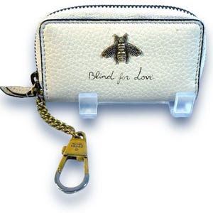 GUCCI Ivory Leather Key Holder with Gold Tone Bee on the Front