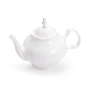 May include: A white porcelain teapot with an ornate design. The teapot has a lid and a spout.