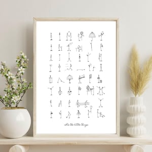 May include: A black and white printable art print with a collection of stick figure drawings. The print features a variety of activities and objects, including a flower, an umbrella, a ladder, a musical note, and a heart. The print is framed and hanging on a white wall. The text "It's the little things" is at the bottom of the print.