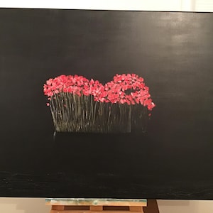 May include: A painting of a cluster of red flowers against a black background.