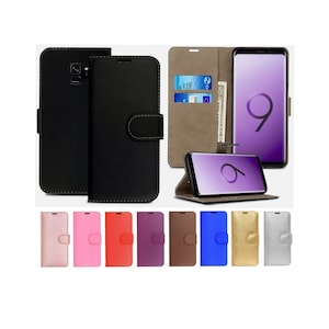 May include: A range of colours of phone cases for the Samsung Galaxy S9. The cases are made of leather and have a flap that covers the screen. The cases have a slot for credit cards and cash. The cases are available in black, pink, red, purple, brown, blue, gold, and silver.