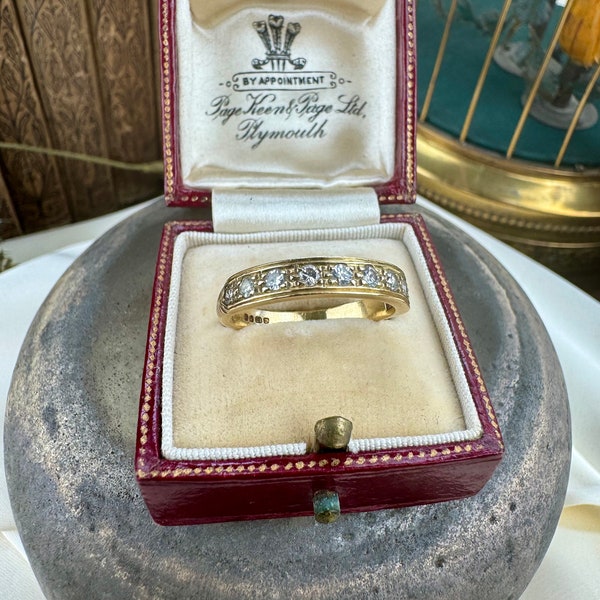 Vintage 18ct gold and diamond half eternity ring.