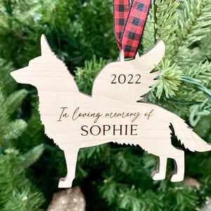German Shepherd Angel Ornament with wings in red buffalo ribbon.