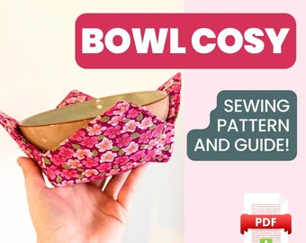 May include: A pink and white floral bowl cozy with a brown bowl inside. The cozy is being held by a hand. The text "BOWL COSY" is in a pink rectangle at the top of the image. The text "SEWING PATTERN AND GUIDE!" is in a white rectangle on the right side of the image. A PDF icon with a download arrow is below the text.