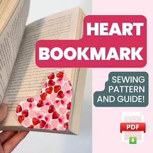 Op de afbeelding: Een hartvormige boekenlegger met een patroon van rode en roze harten is in een boek geplaatst. De tekst "HEART BOOKMARK" staat in een roze banner. Extra tekst luidt "SEWING PATTERN AND GUIDE!" en "PDF".