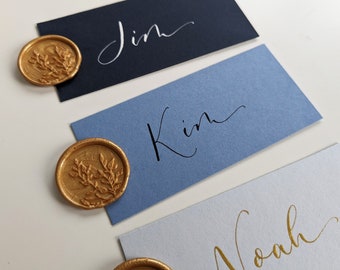 Blue Personalised Place Cards with Gold Wax Seal: Elegant Wedding Calligraphy