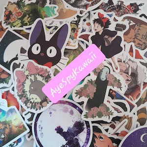 May include: A collection of colourful anime stickers featuring characters from popular shows like Totoro, Kiki's Delivery Service, and Spirited Away. The stickers are printed on white paper and have a glossy finish. The stickers are perfect for decorating laptops, water bottles, notebooks, and other personal items.