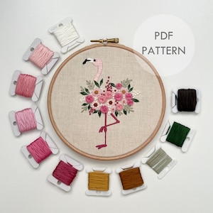 May include: Embroidery pattern for a flamingo with floral accents. The pattern includes 11 different colored embroidery floss spools.