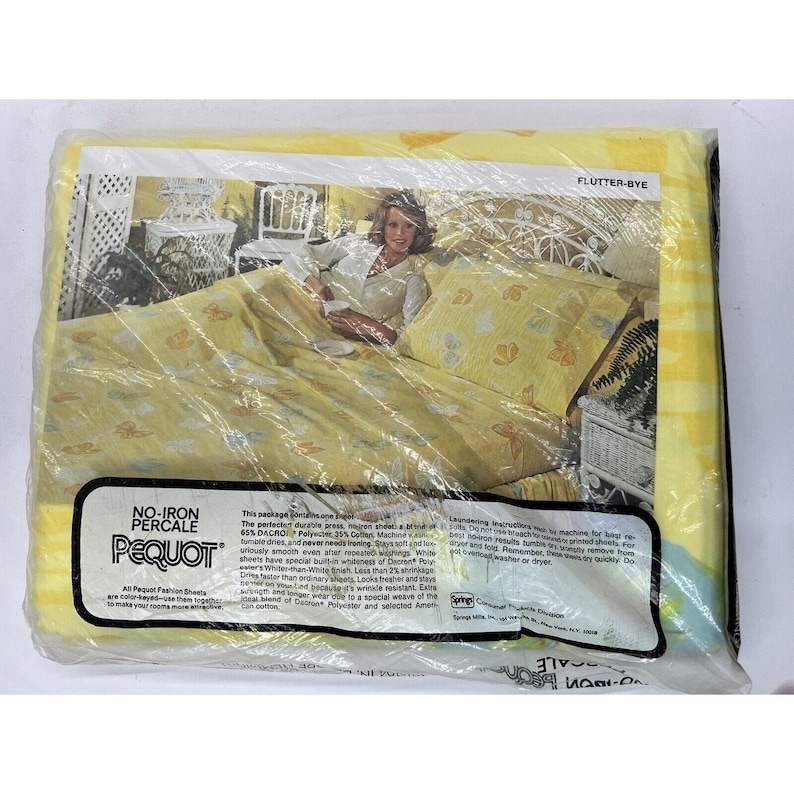 May include: A yellow and white patterned sheet set with butterflies and the text "No-Iron Percale Pequot Flutter-Bye" on the packaging. The sheet set is made of 65% Dacron and 35% cotton.