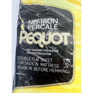 May include: A yellow and white striped packaging for a Pequot No-Iron Percale double flat sheet. The sheet is made of 65% Dacron polyester and 35% cotton. It is designed for a 54x76 inch mattress and measures 81x104 inches before hemming. Made in the USA.