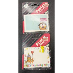 May include: Two Post-it Note pads featuring Garfield the cat. One pad has the text "GUESS WHO?" and the other says "ARE WE HAVING FUN YET?". Each pad is 2.8 inches by 4 inches (7.1 cm x 10.2 cm) and contains 40 sheets.