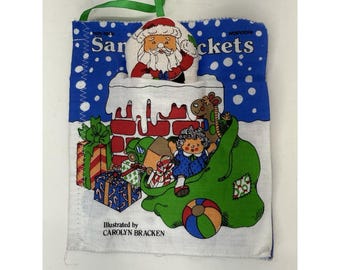 Libro de tela suave de los bolsillos de Santa Claus, Little Simon, 1983, ilustrado por Carolyn Bracken