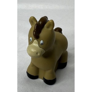May include: A brown plastic toy horse with a brown mane and black hooves. The horse has large white eyes and a light brown face.