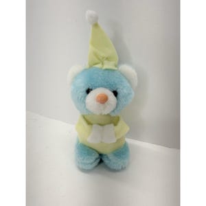 May include: A rustic wooden sign with the text "Welcome to our home" in white lettering. The sign features a distressed finish and a simple, inviting design, perfect for a front porch or entryway.