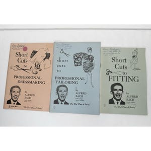 May include: Three instructional booklets by Alfred Bach titled Short Cuts to Professional Dressmaking, Short Cuts to Professional Tailoring, and Short Cuts to Fitting. Each cover features a portrait of the author, illustrations, and black text.