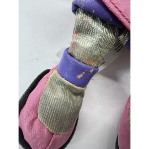 May include: Pink and purple plush toy with a silver and white striped pattern. The toy has a tag that reads "Original Plush Toy, Handmade in Italy".