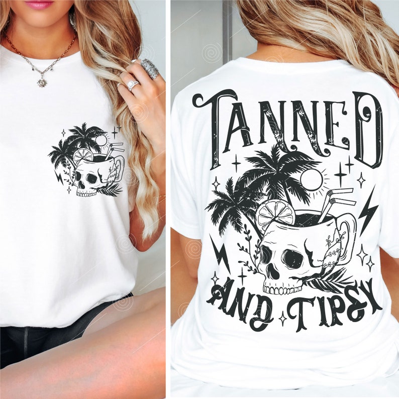 May include: White t-shirt with a black and white graphic of a skull in a cocktail glass with palm trees and the text "Tanned and Tipsy".