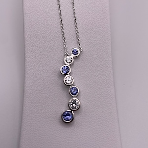 Natural Tanzanite Journey Pendant in Silver with Chain