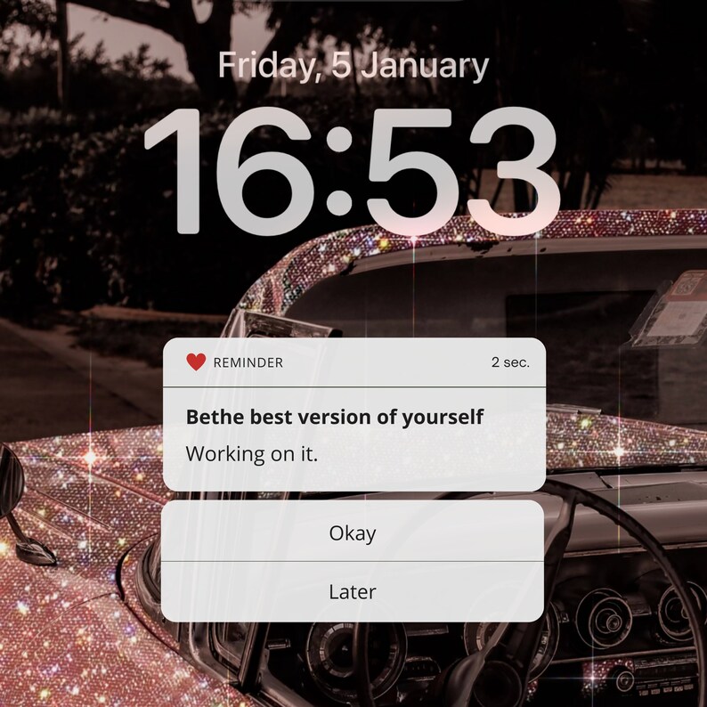 May include: A pink and white phone screen with a reminder notification that says "Bethe best version of yourself. Working on it." The time is 16:53 and the date is Friday, 5 January.