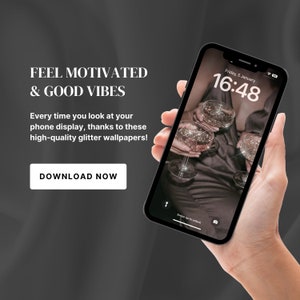 May include: A smartphone displaying a glitter wallpaper with a woman holding a glass of champagne. The phone screen shows the time as 16:48 and the date as Friday, 5 January. The text "Feel Motivated & Good Vibes" and "Download Now" are displayed on the screen.