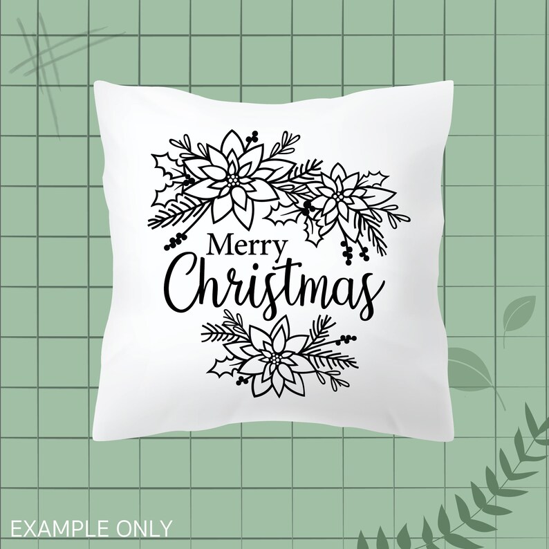 May include: White pillow with a black outline of poinsettia flowers and the text "Merry Christmas".