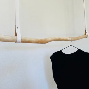 Wardrobe clothes rail made of driftwood / driftwood leather straps