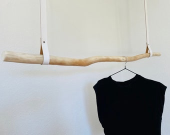 Wardrobe clothes rail made of driftwood / driftwood leather straps