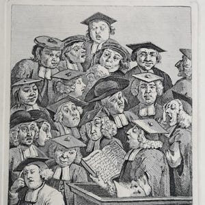 May include: A black and white etching depicts a crowd of people, many wearing hats and collars, gathered in a room. Some are looking at a book. The image has a vintage feel, with detailed lines and shading. The text "Published by Hogarth March 1, 1736" is at the bottom.