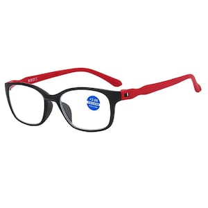 May include: Black framed reading glasses with red arms. The glasses have a blue sticker on the right lens that says " +2.00  防蓝光  BLUE LIGHT BLOCKING".