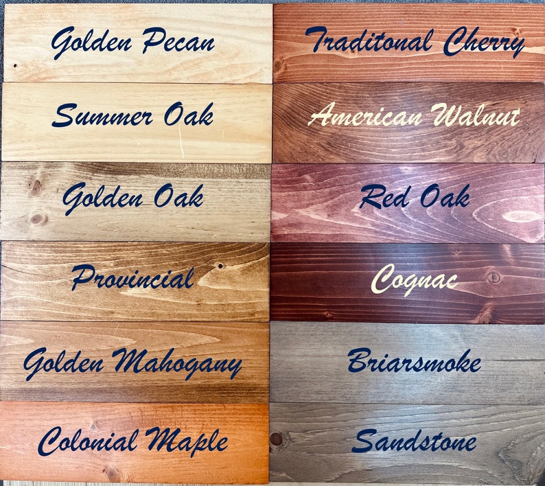 May include: Wood stain color chart with 12 different wood stain colors. The colors are: Golden Pecan, Summer Oak, Golden Oak, Provincial, Golden Mahogany, Colonial Maple, Traditional Cherry, American Walnut, Red Oak, Cognac, Briarsmoke, and Sandstone.