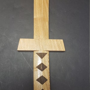 Samarai sword crafted from black ash wood.
