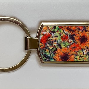 Sunflower silver metal Keyring. The image is taken from one of Philippa Savage's beautifully coloured and textured oil paintings.
