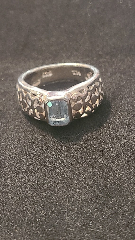 Sterling Silver 9x7MM Aquamarine Open Floral Ring