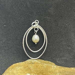 Sterling Silver Egg Shaped with dangling Pearl Charm image 1