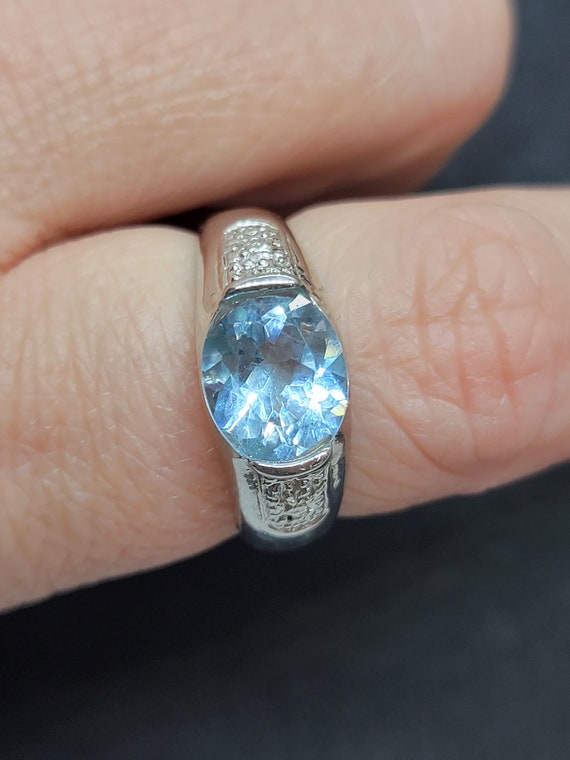 Sterling Silver 10x8MM Oval Blue Topaz Ring