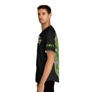 May include: A black jersey with a green and purple graphic print on the right side. The text "Schwifty" is printed on the right sleeve.