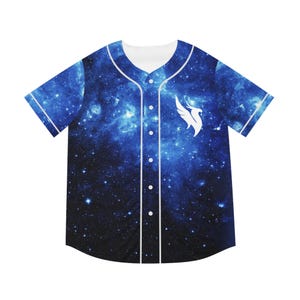 May include: A short-sleeved baseball jersey with a celestial galaxy design in shades of blue and white. The jersey features a white collar, buttons, and trim, and a white logo on the chest.